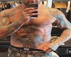 He is fond of tattoos and many of them are on diff He is fond of tattoos and many of them are on different parts of his body like the sun encircling his belly button, he has a big tribal style tattoo o